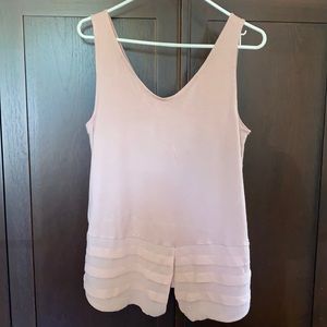 Light pink tank with layers at bottom